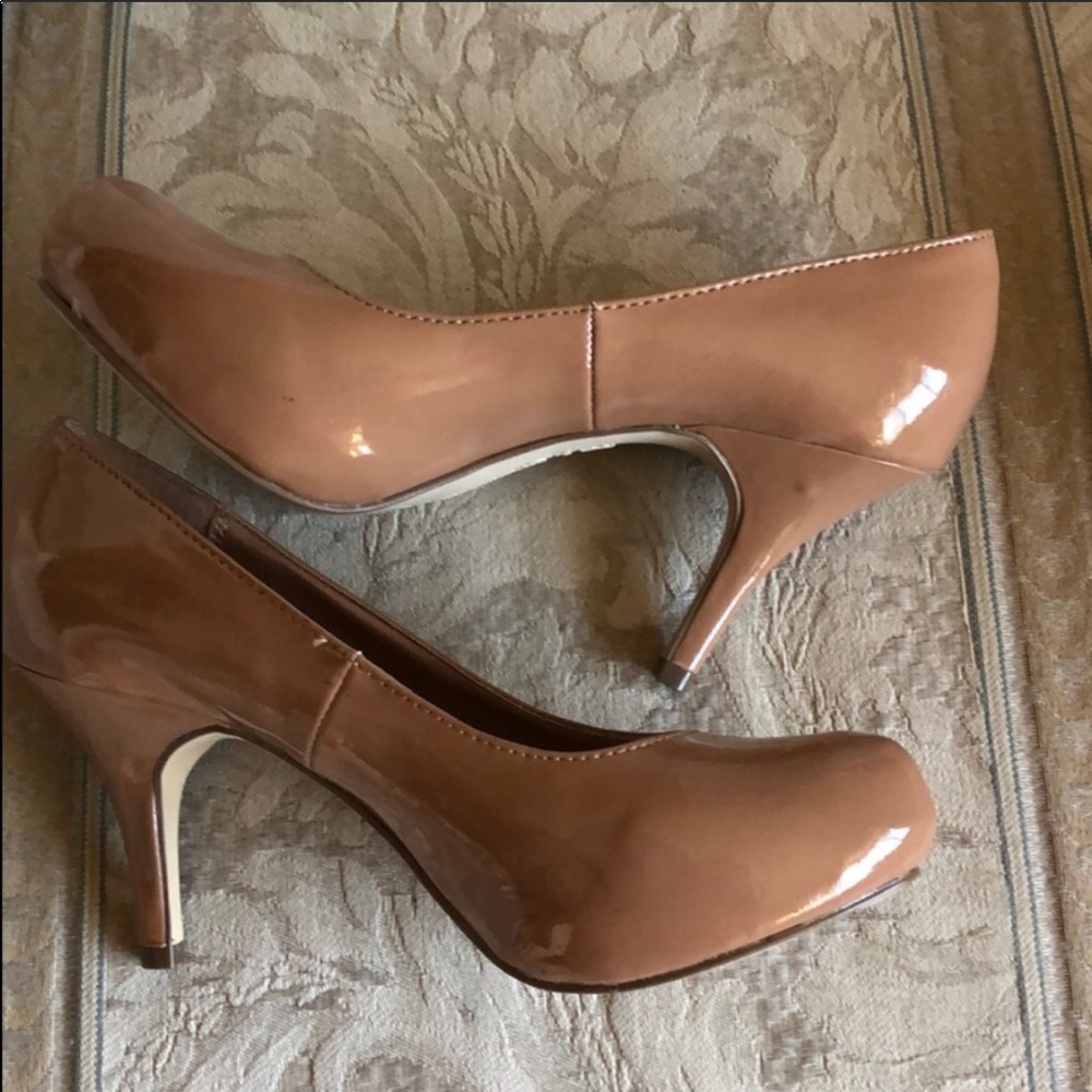 Tan colored pumps with heels